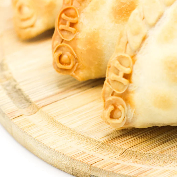 CHORIZO & KAAS EMPANADAS